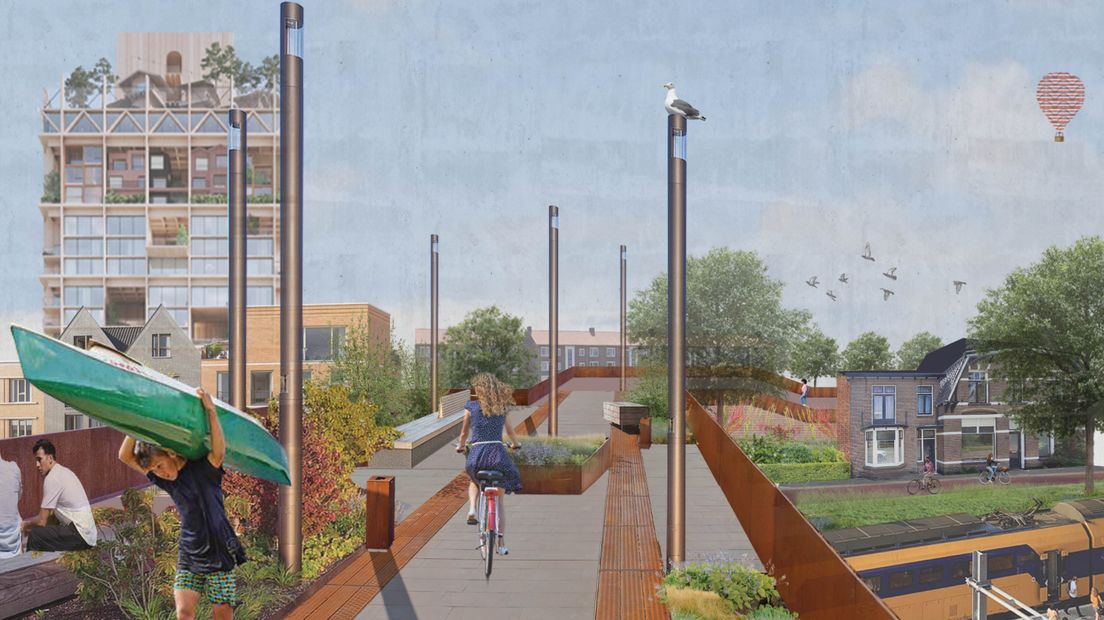 Een loopbrug moet de stadsdelen die door het spoor gescheiden zijn, weer met elkaar verbinden