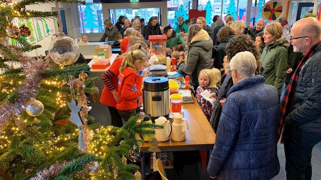 Drukte op de markt voor KWF