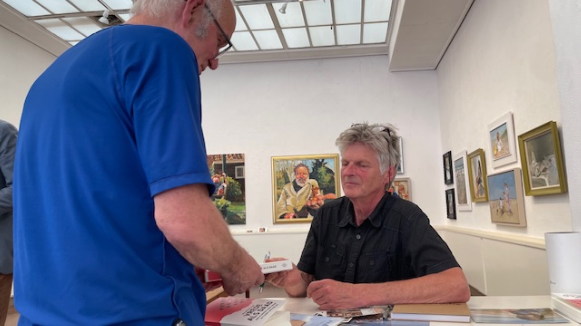 Willem de Haan bij de presentatie van zijn boek