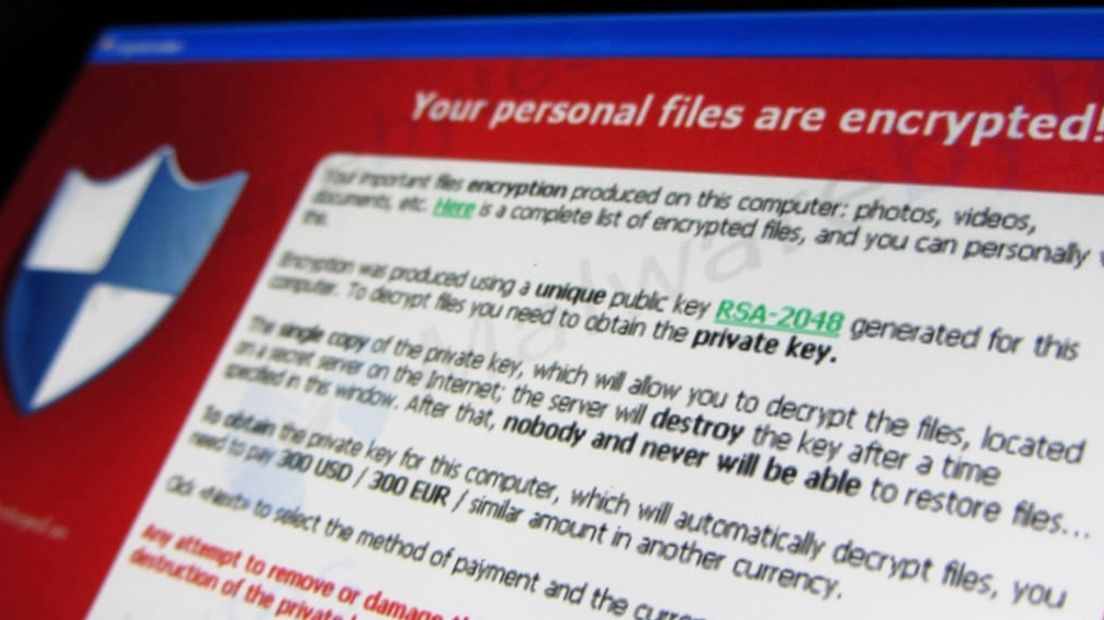 Bericht op scherm van computer die is getroffen door gijzelsoftware