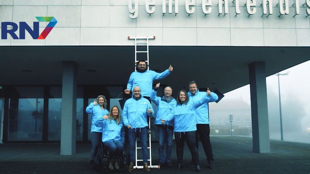 Welzijn Druten poetst belettering gemeentehuis. Foto: Still uit video Welzijn Druten Welzijn Druten poetst belettering gemeentehuis. Foto: Still uit video Welzijn Druten