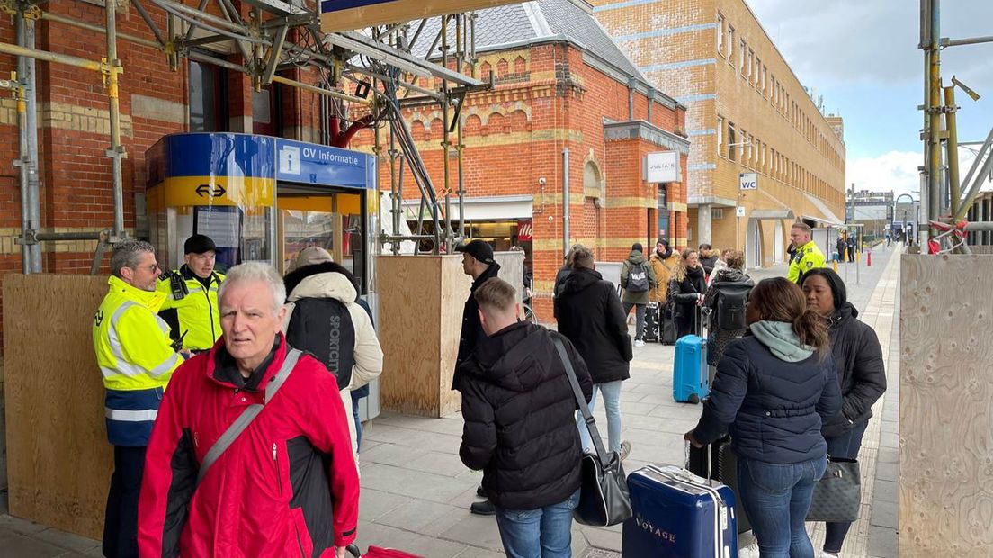 No trains?  Stranded travelers keep their spirits up at the main station