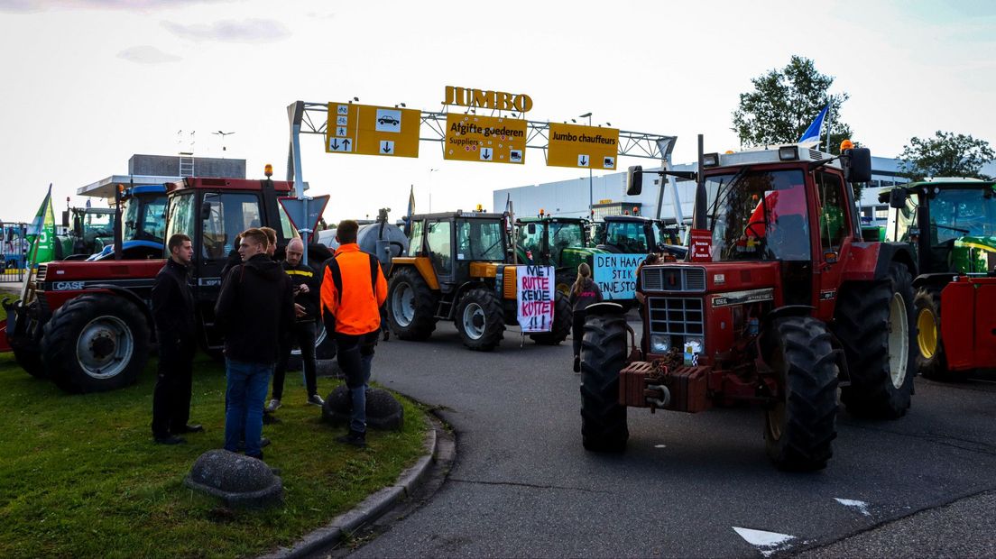 Farmers block the entrance to Jumbo distribution center