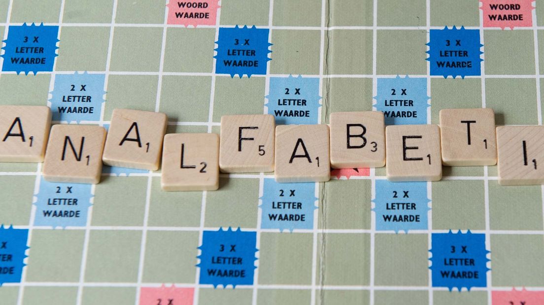 Analfabetisme op een Scrabblebord