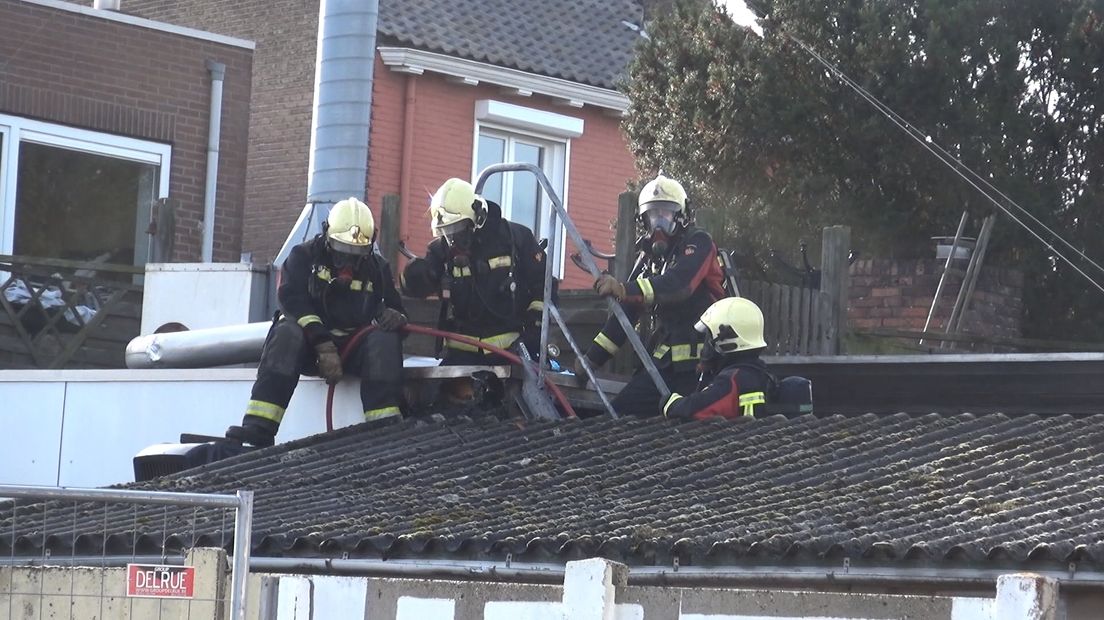 Brandweermannen aan het werk