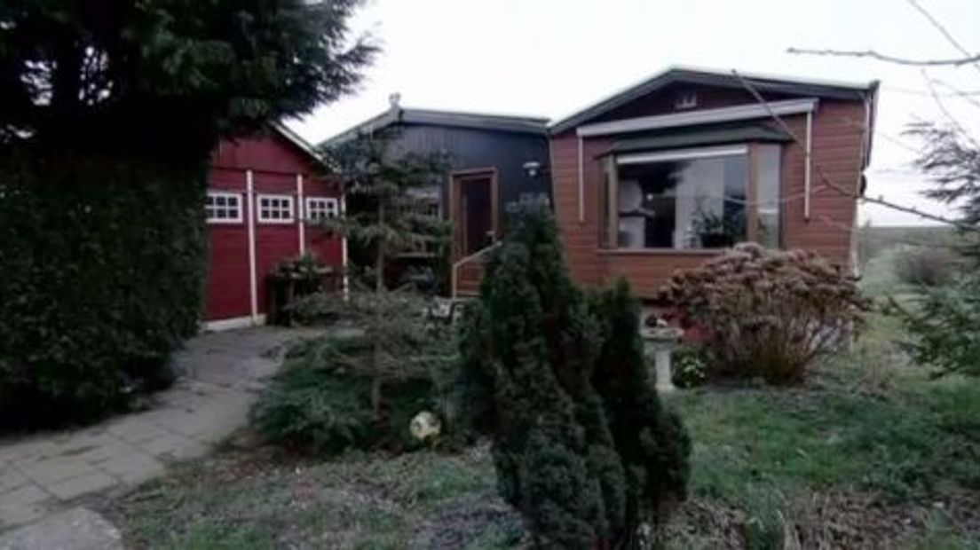 In dit chalet in Lopikerkapel was de zeer gewelddadige overval.