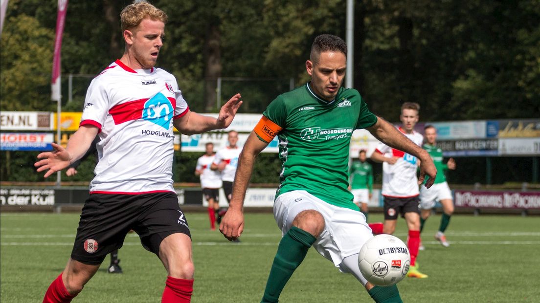 Caglar Uguz in actie tegen Hoogland