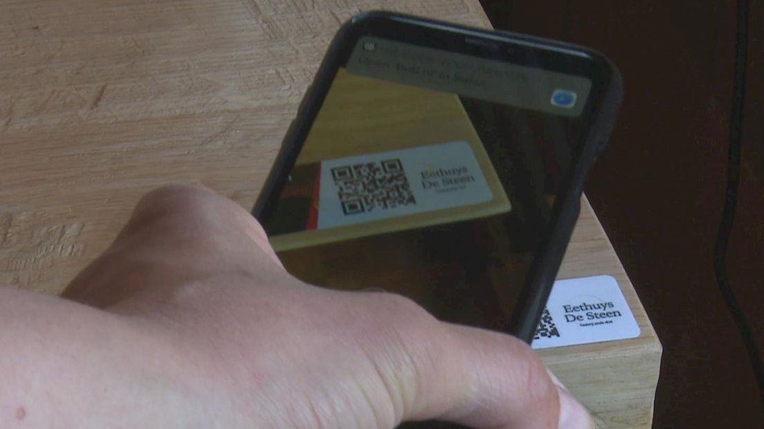 QR-code scannen om de digitale kaart te zien