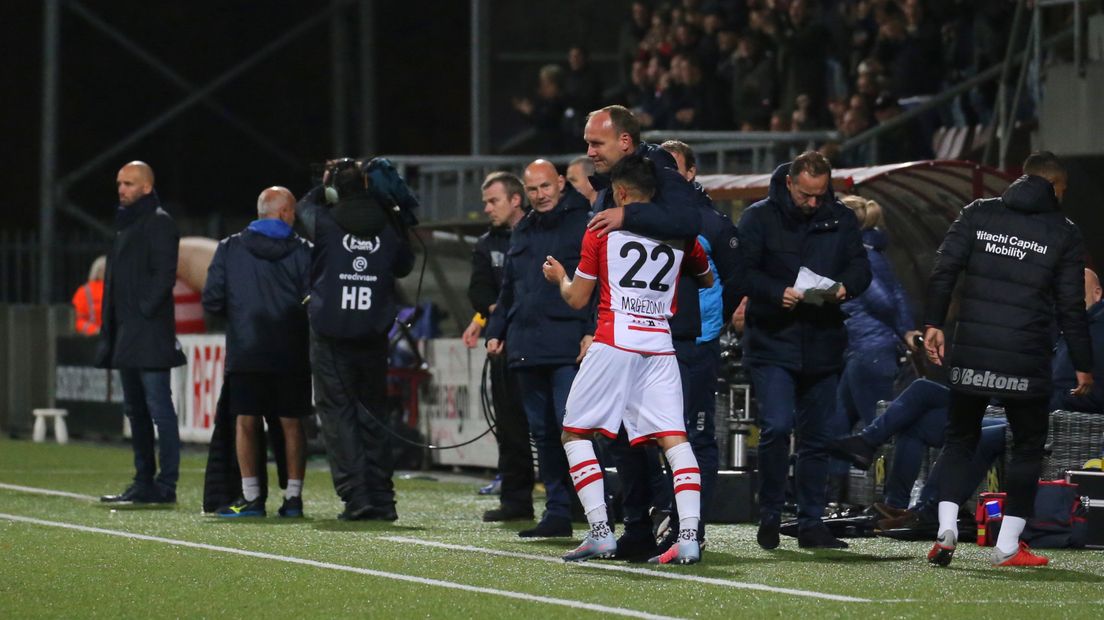 Dick Lukkien viert de openingstreffer tegen NAC met doelpuntenmaker Caner Cavlan (foto Gerrit Rijkens)
