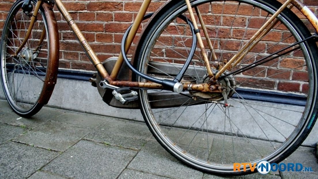 In het rek, die fiets