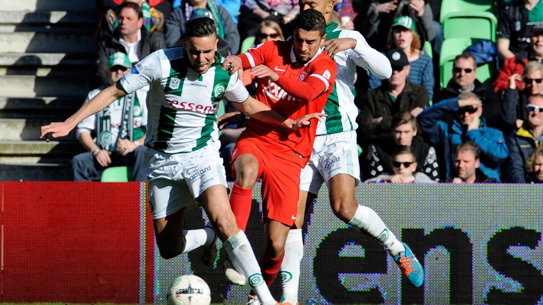 Albert Rusnak met FC Twente-speler Youness Mokhtar.