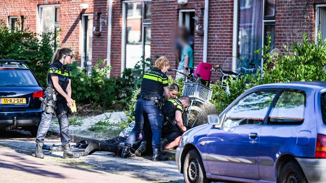 Officers arrest a suspect