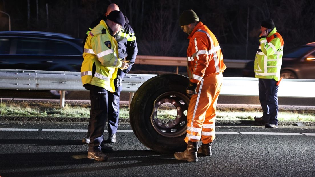 Rescuers with the truck wheel melted