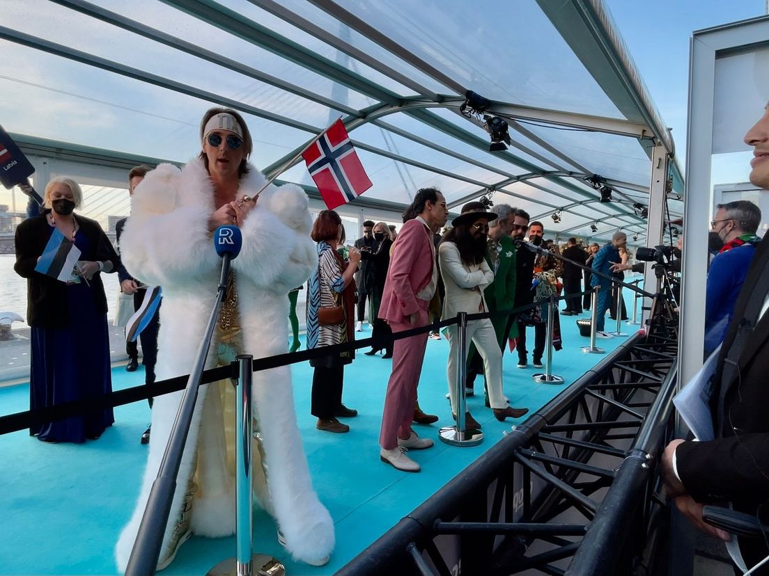 De turquoise loper bij de openingsceremonie
