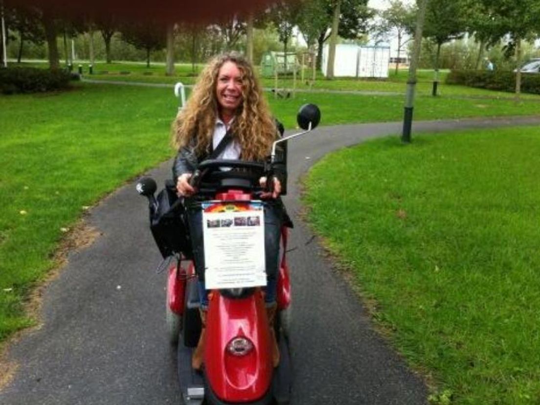 Verslaggever Ilse op scootmobiel