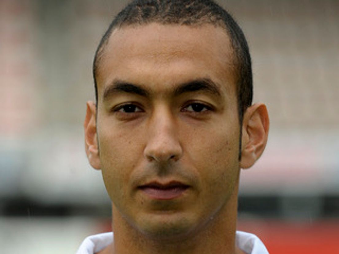 touzani.cropresize.1.jpg