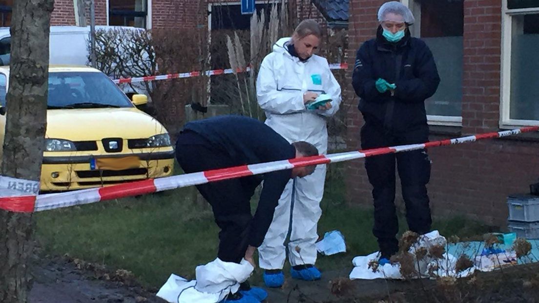 Een onderzoeksteam op een plaats delict