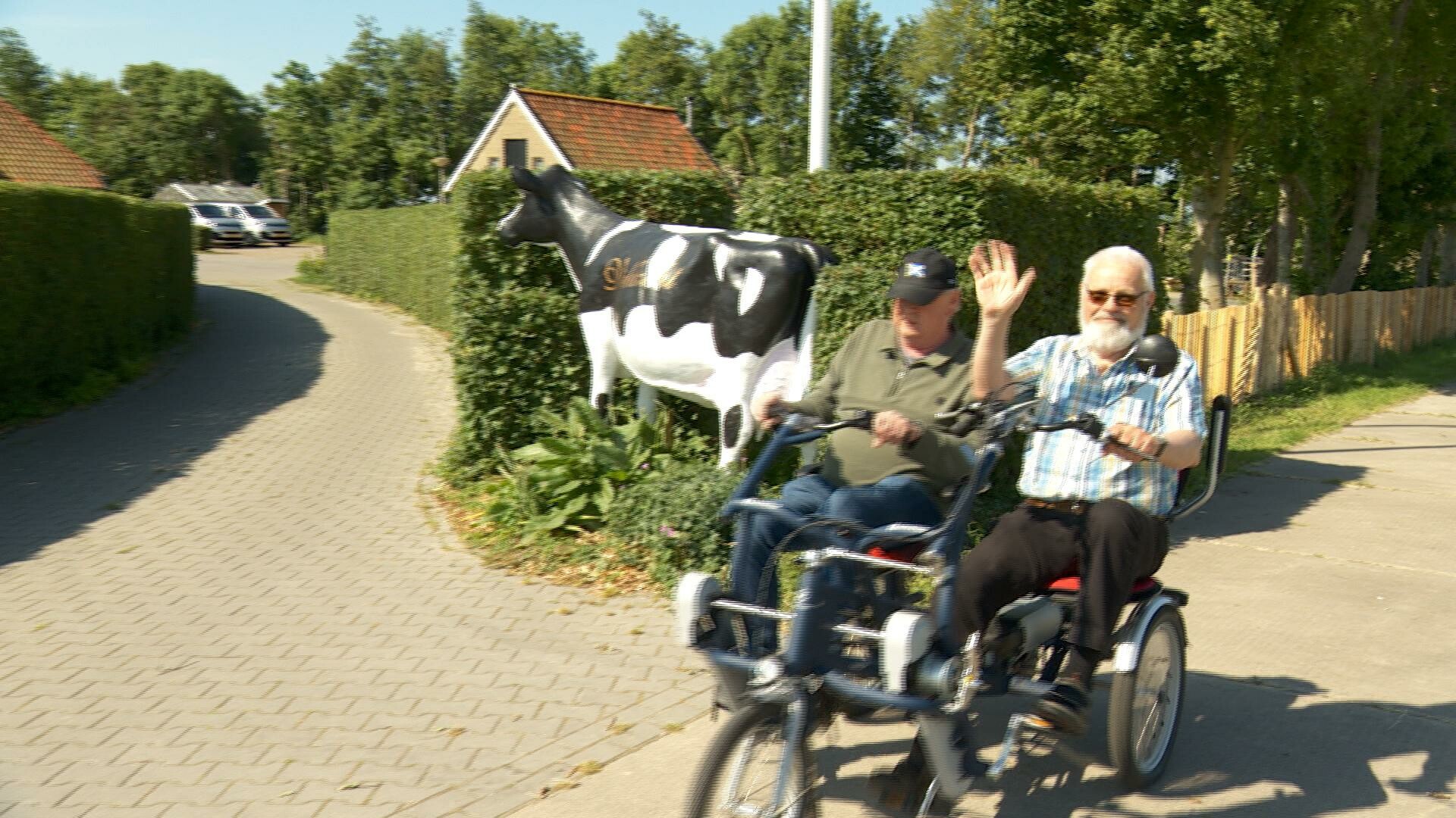 Jan Werumeus-Buning op de duofiets