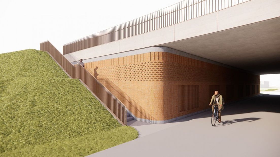 Zicht op fietspad onder brug en trap
