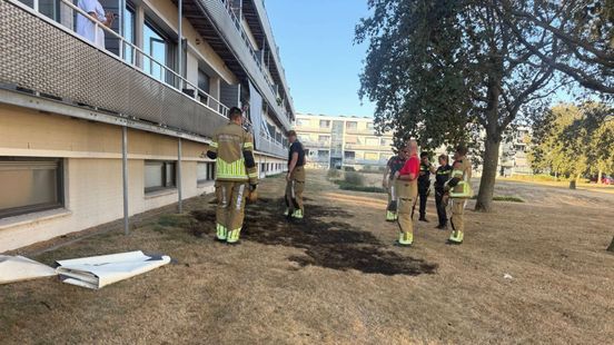 Brand door hete pan op balkon