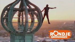 Rondje Groningen: Man beklimt Martinitoren tijdens zonsopkomst