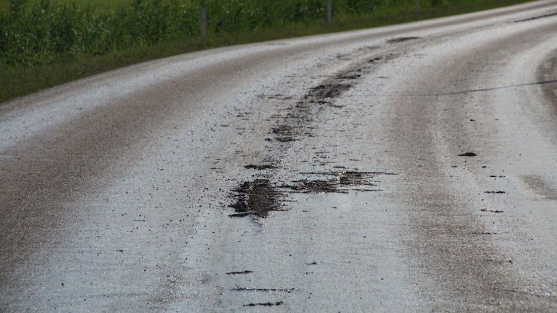 Losgelaten slijtlaag Randweg