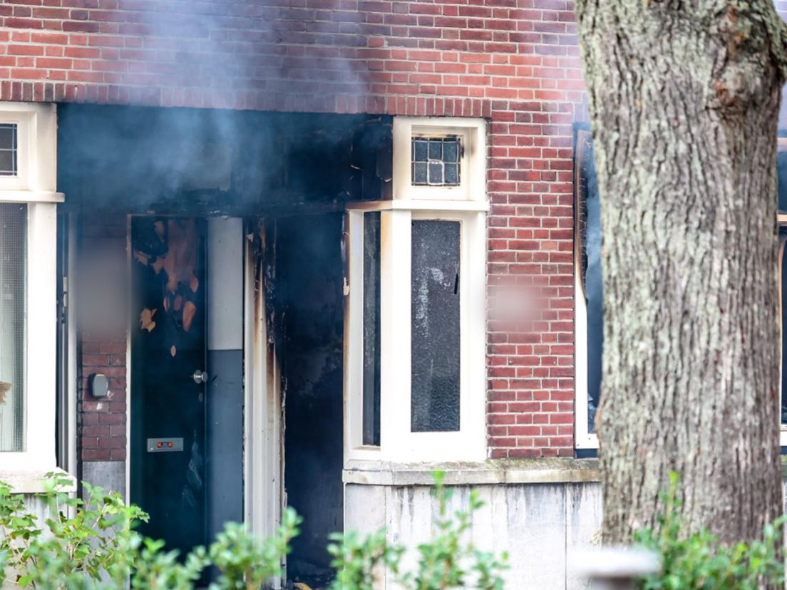 De verdachte schoot zijn buurvrouw dood en stichtte brand in het pand aan het Heiman Dullaertplein