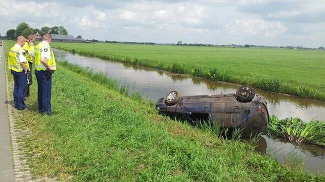 Auto te water in Mastenbroek