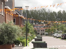 Oranje vlaggetjes zorgen voor volle containers in Numansdorp