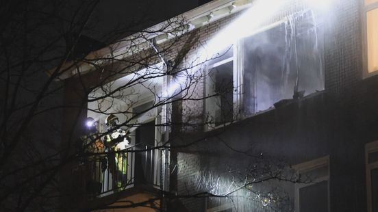 Uitslaande brand in portiekwoning