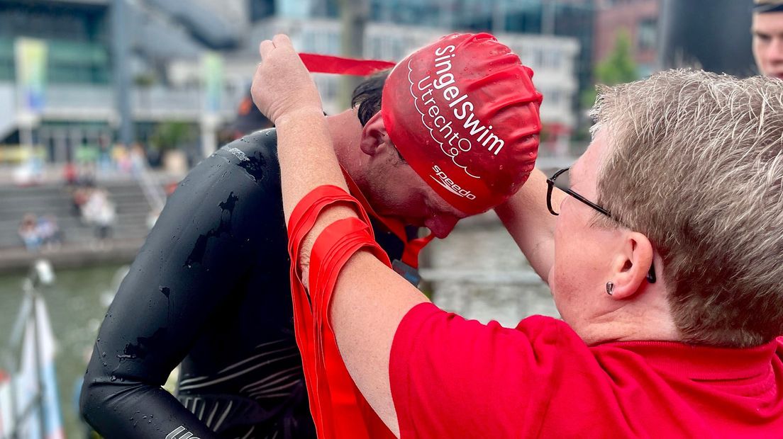 Welke afstand je ook hebt afgelegd, bij de finish is er voor iedereen een medaille