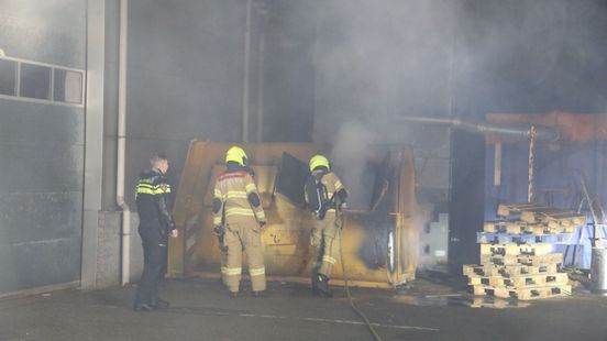 Brand in container • botsing op brug.