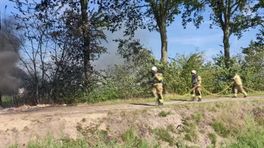 Brandweer blust brand bij Spier