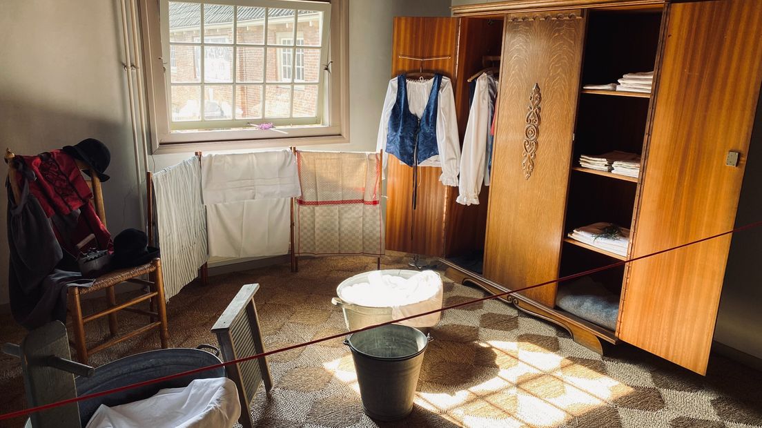 Een kamer van het huisje is ingericht als wasruimte