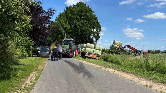 Auto botst op trekker • brandweer bevrijdt persoon