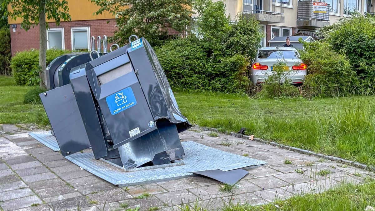 Auto ramt container in Leeuwarden en eindigt in tuin