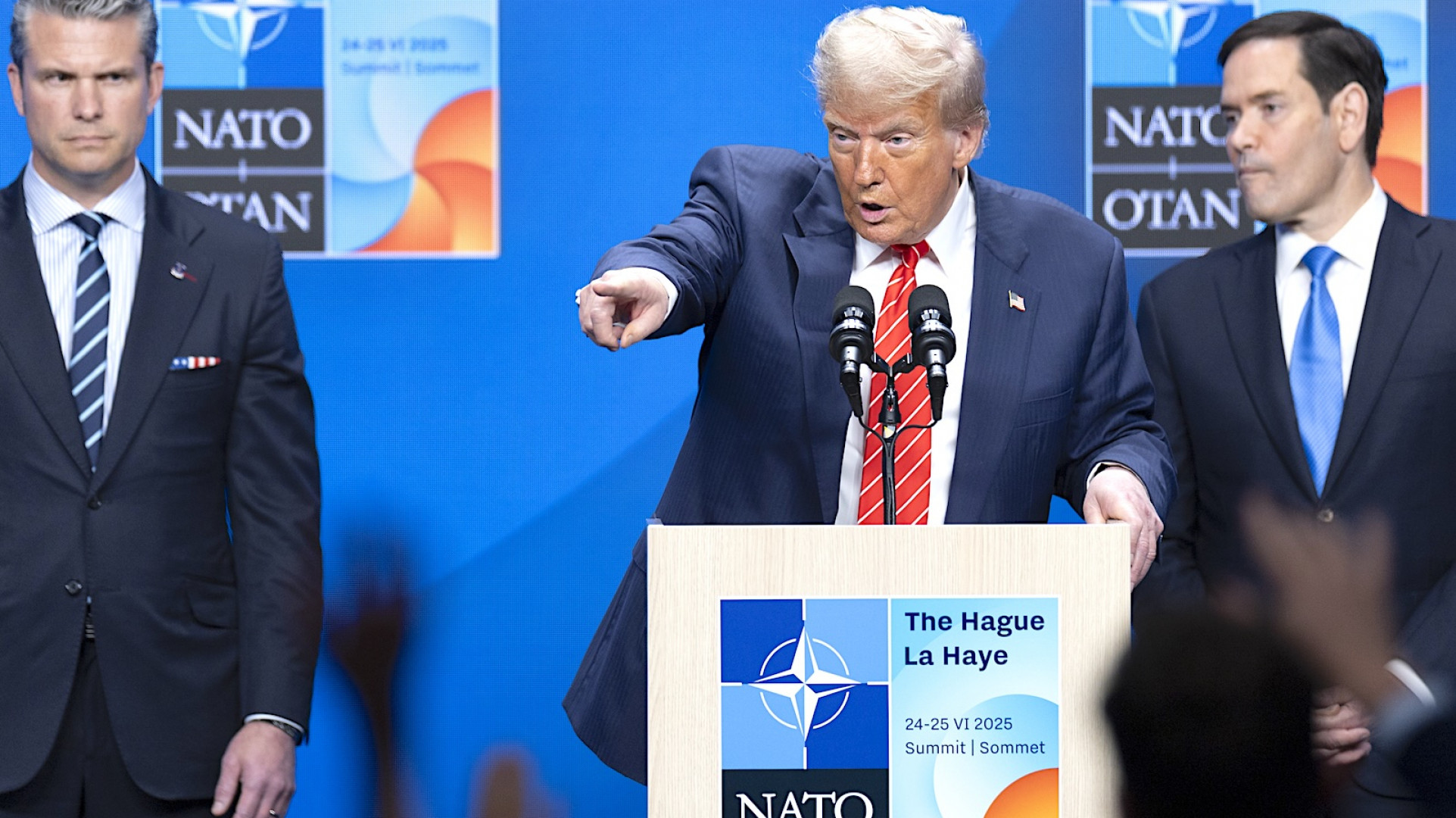 De Amerikaanse president Donald Trump tijdens zijn speech op de NAVO-top