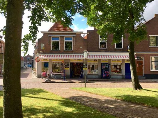 Bevestigen aan schors Nieuwsgierigheid Koninklijke' drogisterij in Oude-Tonge - Rijnmond