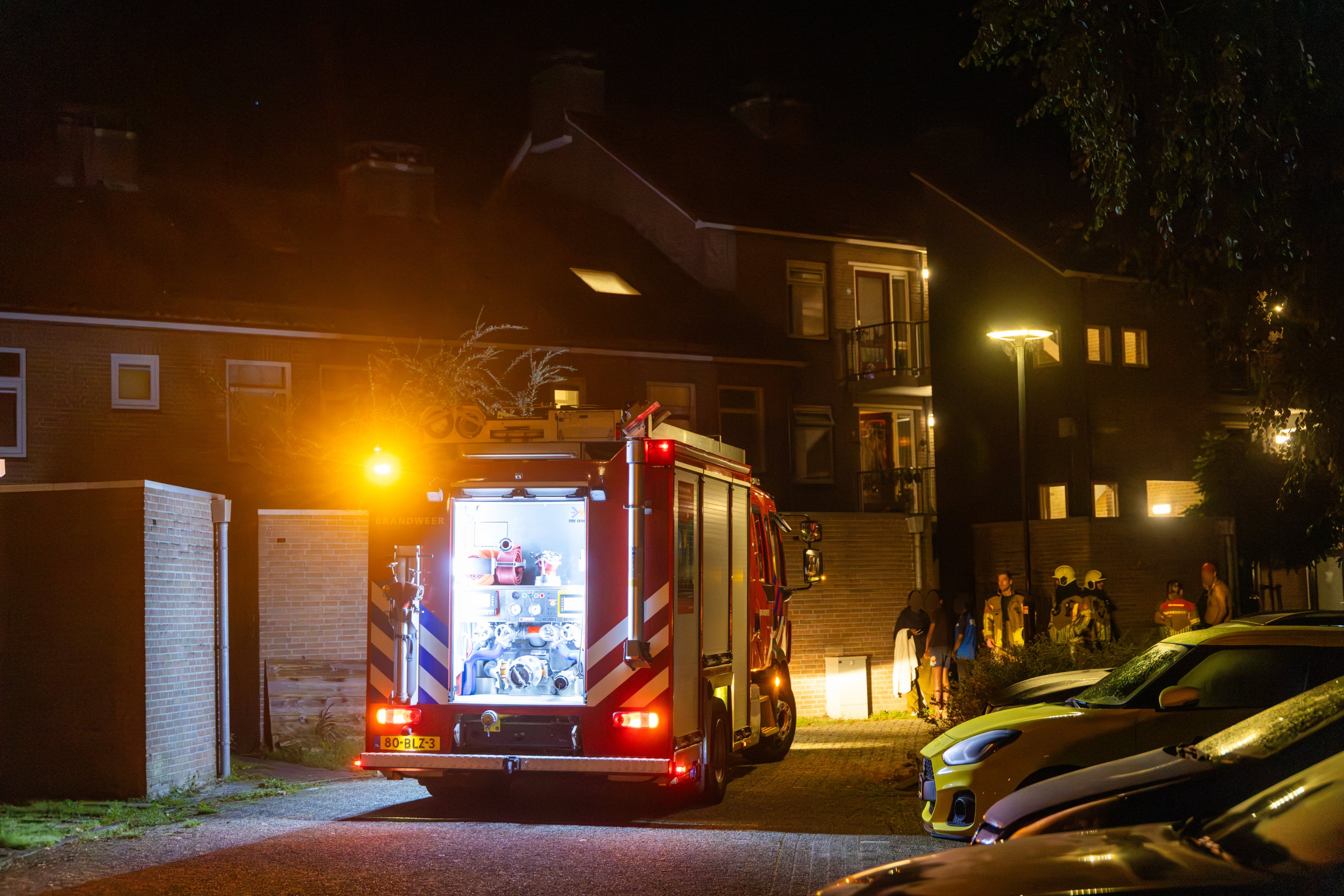 De brandweer op de plaats van het incident