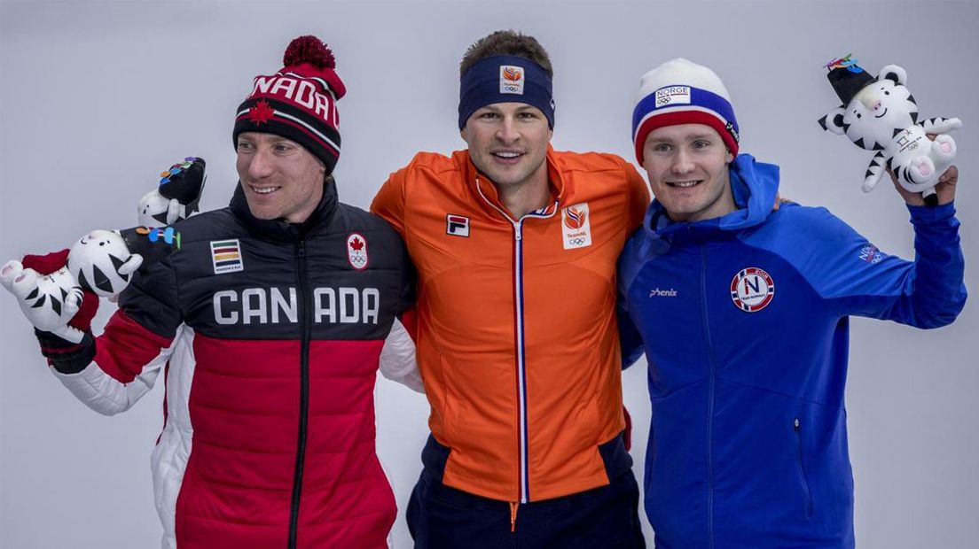 Het podium op de 5000 meter: Bloemen (links), Kramer (midden) en Pedersen. 