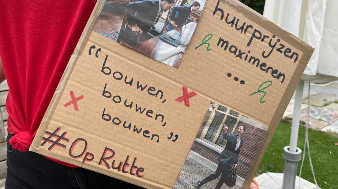Het bord dat Pauline draagt in Amsterdam
