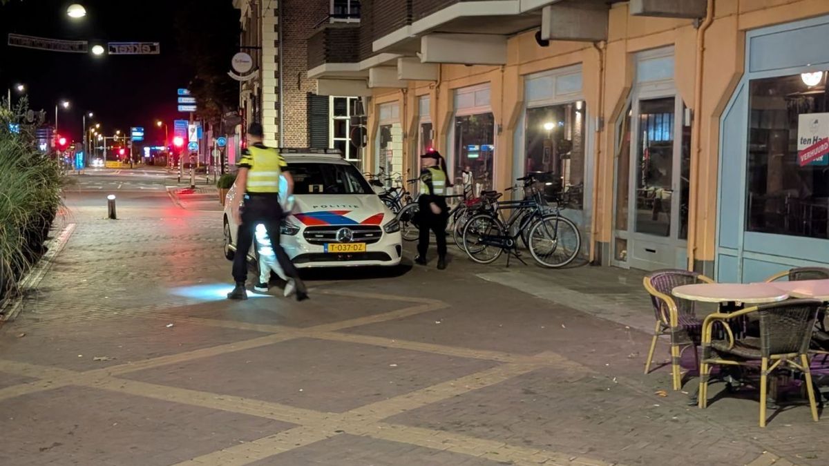 Agenten ondergespoten met champagne, twee mensen aangehouden