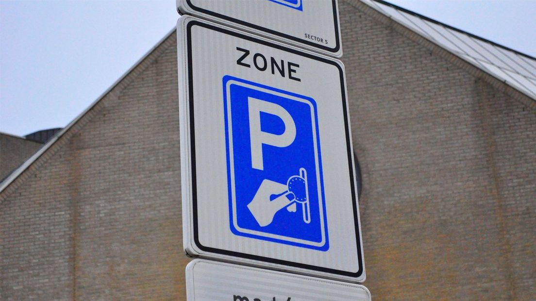 Een verkeersbord betaald parkeren