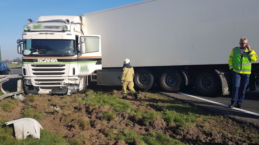 File door geschaarde vrachtwagen