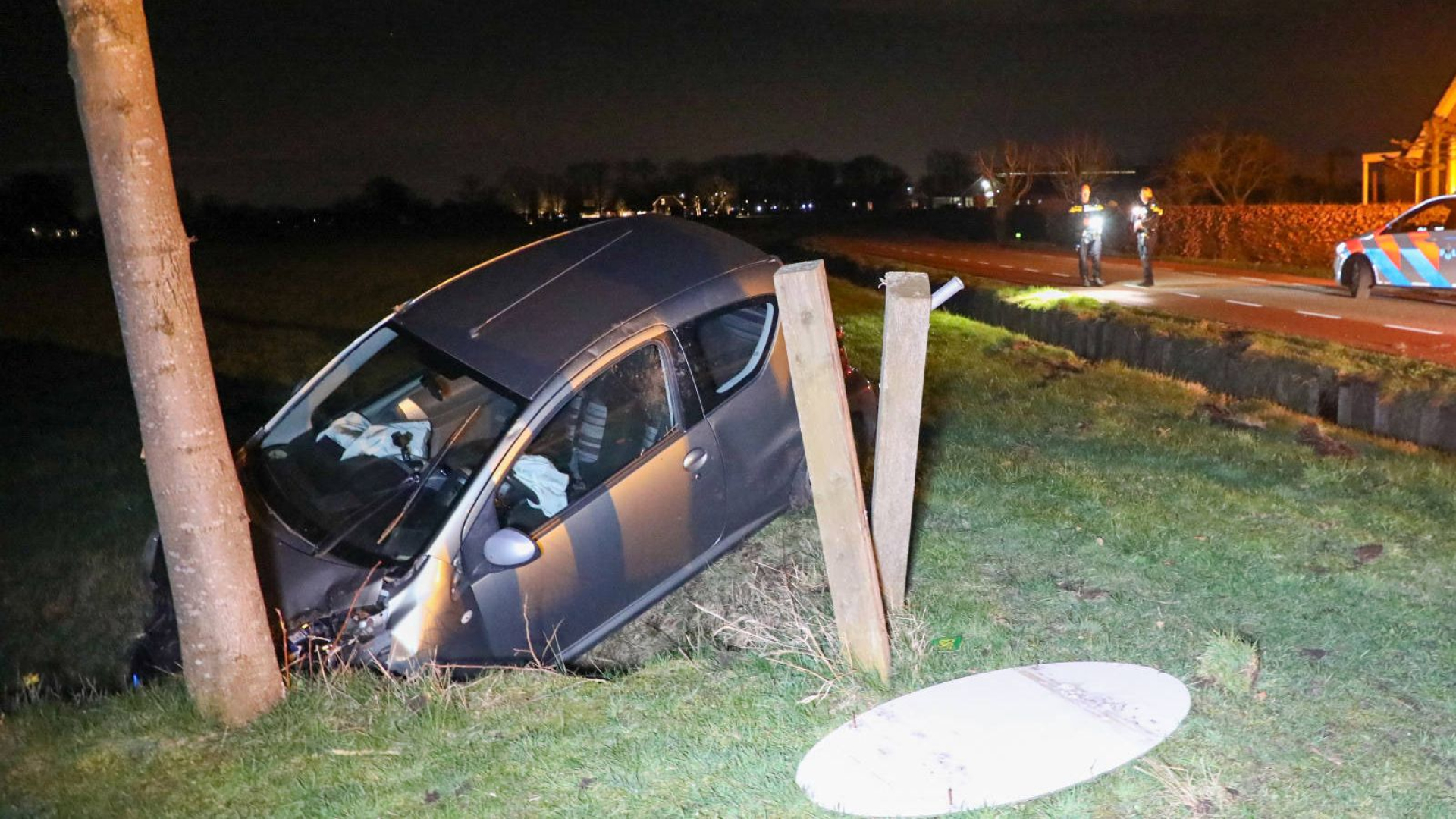 Auto's te water • gewapende overval