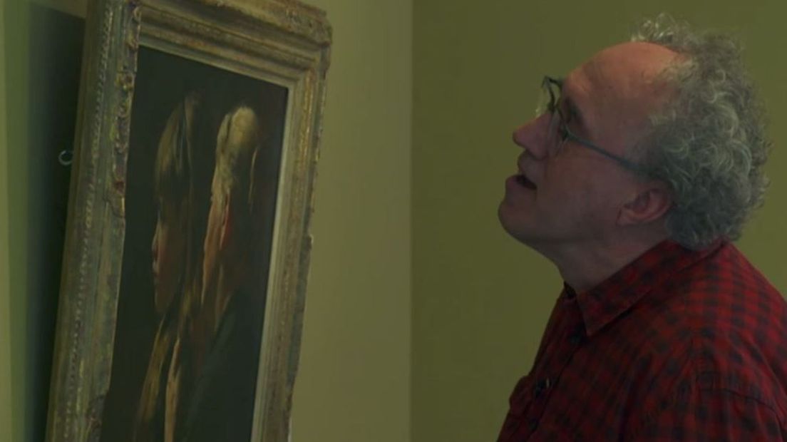 Pieter van Eekelen voor een schilderij van Briët