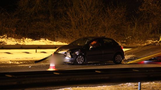 Automobilist overleden • dak ingezakt