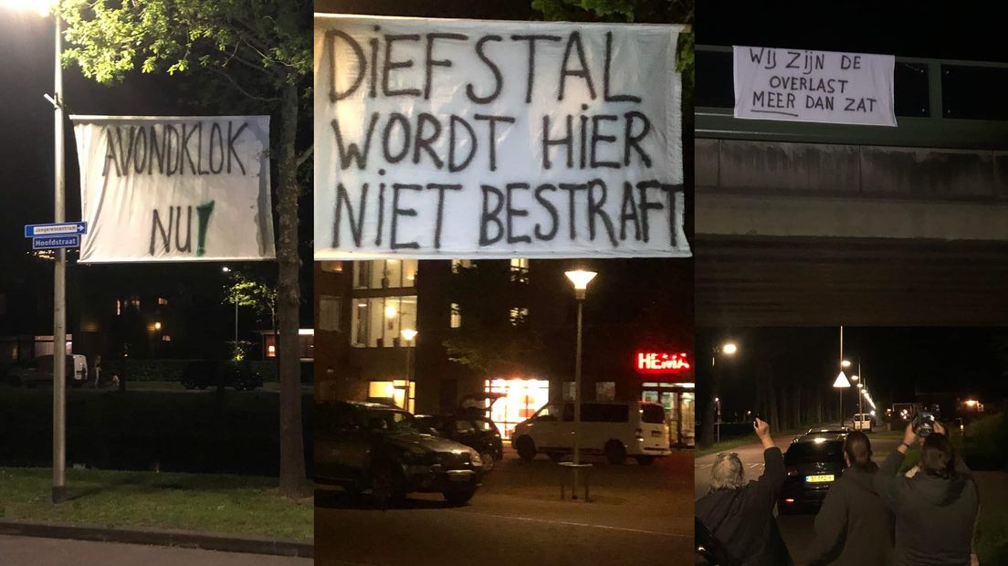 Drie van de opgehangen spandoeken