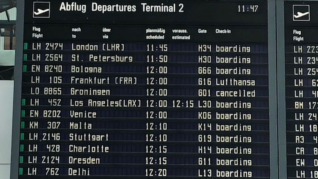 Op het bord in München is te lezen dat de vlucht naar Groningen niet doorgaat