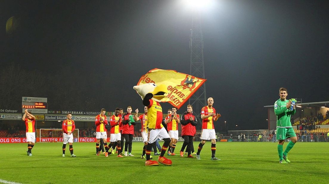 De spelers vieren de overwinning